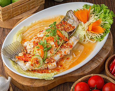Pla Nueng Manao (ปลากระพงนึ่งมะนาว)