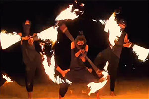 Koh Samui beach fire show incorporating flow arts and fire spinning